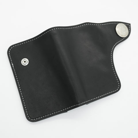 Rugged full-grain horsehide wallet with brass concho snap