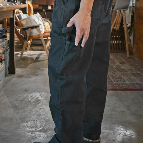 HGS Painter’s Pants Black model wearing side view showing side pocket in Rugged Gentlemen Shoppe Singapore, rugged workwear pants by Heritage General Store