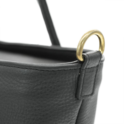Close-up on Brass hardware of Handmade Black Fullgrain Tumbled Cowhide Leather Totebag, handmade by Obbi Good Label Singapore