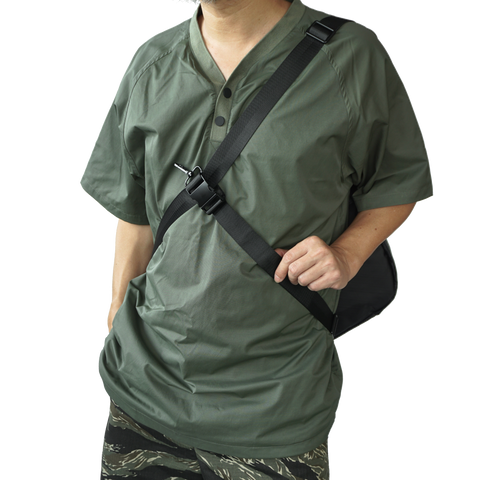 model using body-secure strap on obbi good label OriGinaLe XTAC Hobo Bag in Black