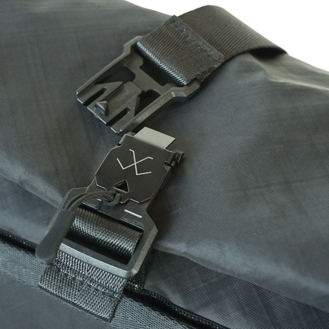 XTAC Black roll-top hobo bag featuring ECOPAK sailcloth and Fidlock closure, designed by Obbi Good Label