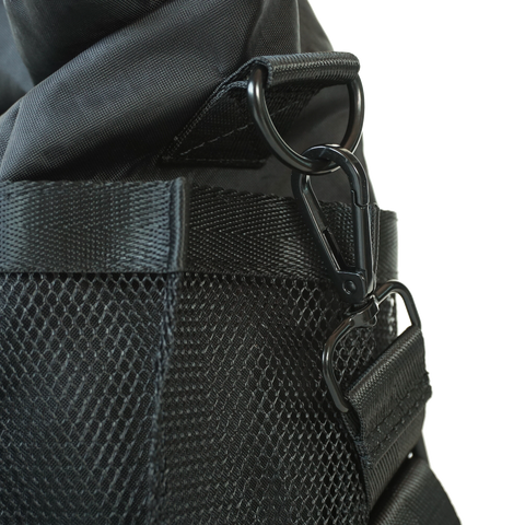 Black roll-top tote bag made from ECOPAK sailcloth with Fidlock magnetic closure by Obbi Good Label