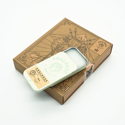 Compact tin of Yama Solid Cologne with Sakura and green tea, crafted for Singapore & SE Asia.