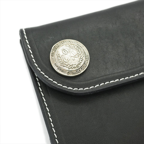 Premium horsehide leather wallet close up stitching and concho detail