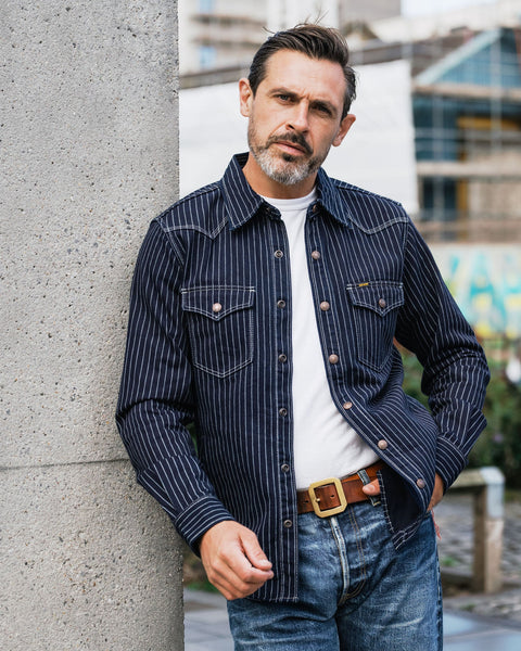 Model wearing Iron Heart IHSH-227-IND 12oz CPO Wabash Shirt outdoor lighting