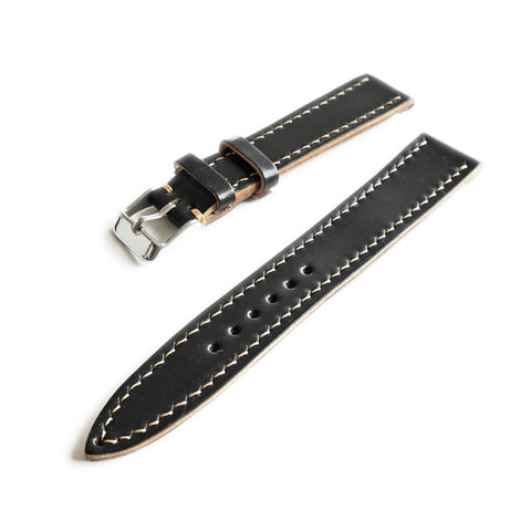 Hand saddle stitched Horween Shell Cordovan watch strap showing traditional leather craftsmanship