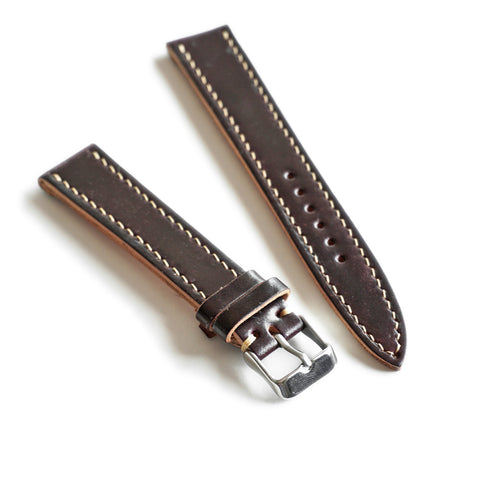 Stainless steel buckle fitted to hand-stitched Horween Shell Cordovan watch strap