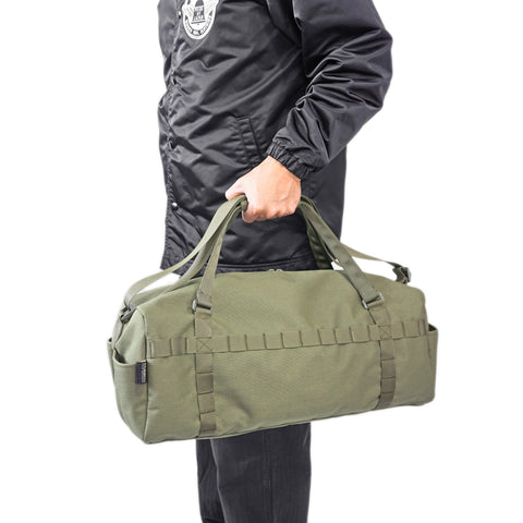 OriGinaLe Boston duffle bag hand carry lifestyle by model in Rugged Gentlemen Shoppe Singapore