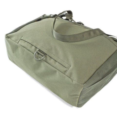 OriGinaLe Origo Roll-Top Tote Bag in olive technical canvas showing bottom construction and trolley sleeve at the back of the bag