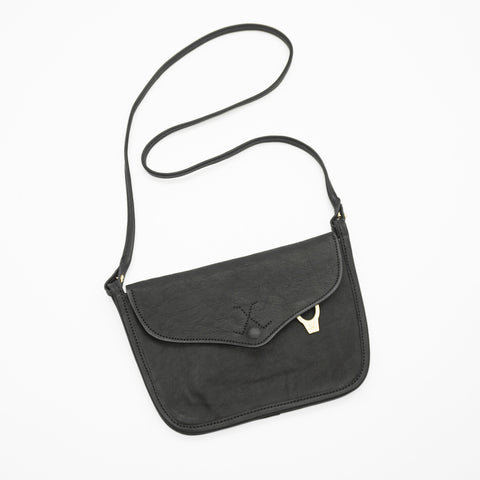 Full-grain compact crossbody bag with flap closure and card slots