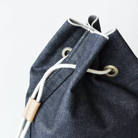 FAITH SFK LEATHER DENIM BUCKET BAG INDIGO