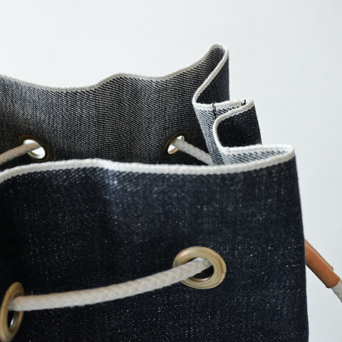 FAITH SFK LEATHER DENIM BUCKET BAG INDIGO