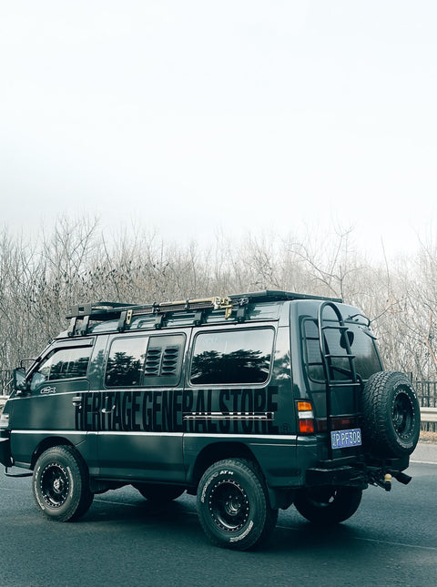 Heritage General Store rugged outdoor menswear, showing the modified outdoor camping van