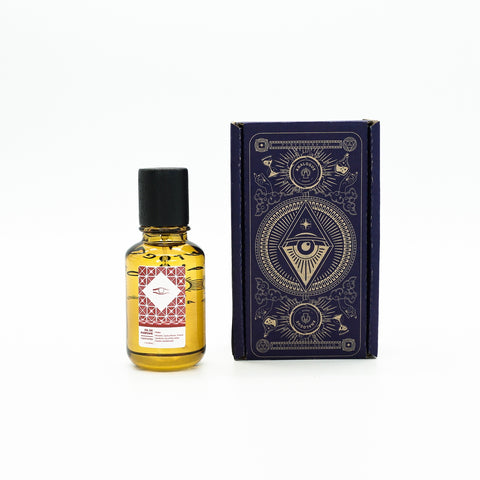 Bottle of Cleopatra Oil de Parfum, floral and woody tones