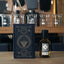 Bottle of Colossus Oil de Parfum with citrus and spice notes