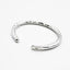 OGL OBBI GOOD LUCK HAND-HAMMERED SILVER BANGLE