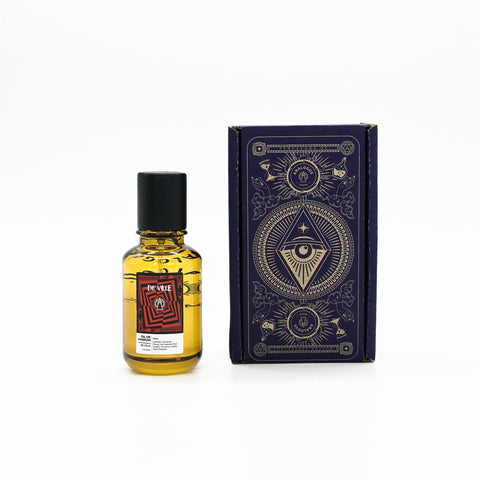 Bottle of Deville Oil de Parfum featuring cherry, leather and vanilla notes, available in Singapore & Worldwide.