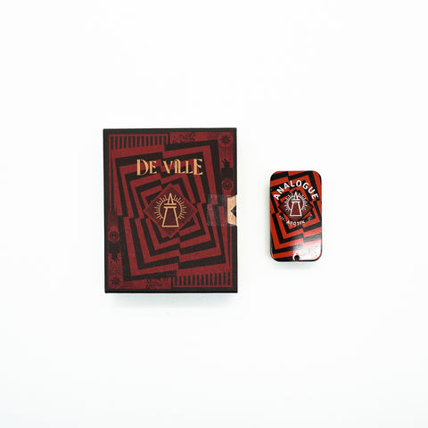 Compact tin of Deville Solid Cologne with cherry and leather notes, crafted for Singapore & Worldwide.