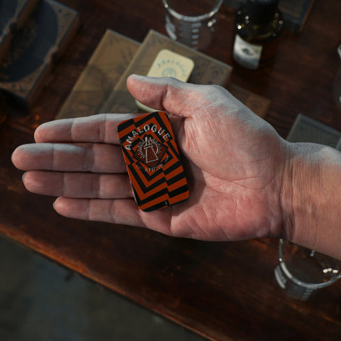 Compact tin of Deville Solid Cologne with cherry and leather notes, crafted for Singapore & Worldwide.