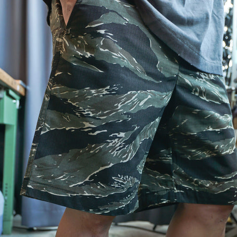 HGS Tiger Camouflage Shorts model wearing close-up fabric view in Rugged Gentlemen Shoppe Singapore, rugged outdoor shorts by Heritage General Store