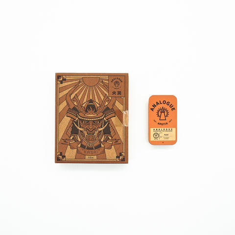 Compact tin of Kasai Solid Cologne with vetiver and spice notes, crafted for Singapore & Worldwide.