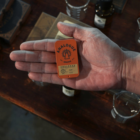 Compact tin of Kasai Solid Cologne with vetiver and spice notes, crafted for Singapore & Worldwide.