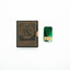 Compact tin of Khan Solid Cologne with citrus, spice and sandalwood, handcrafted for Singapore & Worldwide.
