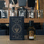 Bottle of Omegha Oil de Parfum with pineapple, bergamot and oakmoss, available in Singapore & SE Asia.