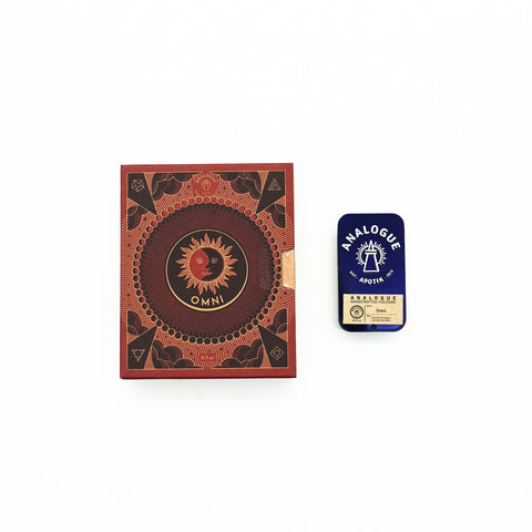 Compact tin of Omni Solid Cologne with leather and dark berry notes, crafted for Singapore & SE Asia.
