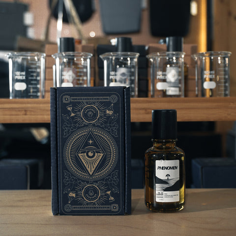 Bottle of Phenomen Oil de Parfum with sandalwood, oak and red berries, available in Singapore & SE Asia.