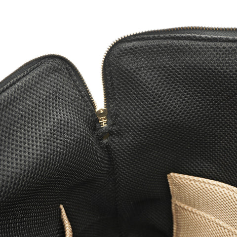 Interior of OGL leather laptop briefcase with padded compartments and storage pockets
