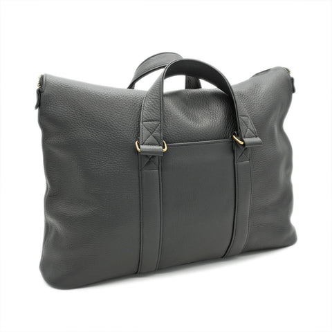 Handmade black leather briefcase with fold-down design and premium full-grain leather