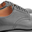 Side view of OGL BRAVE plain-toe Derby shoe showing premium quality of fullgrain black horsehide leather 