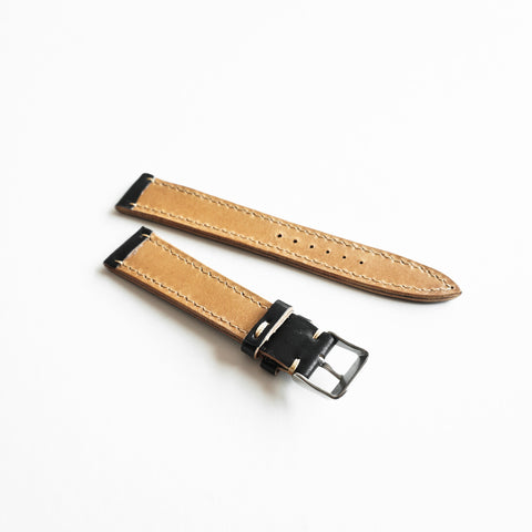 Hand saddle stitched Horween Shell Cordovan watch strap showing traditional leather craftsmanship