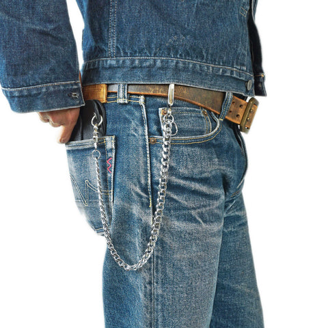 OGL silver-plated Cuban wallet chain worn with faded selvedge denim jeans and a leather belt.
