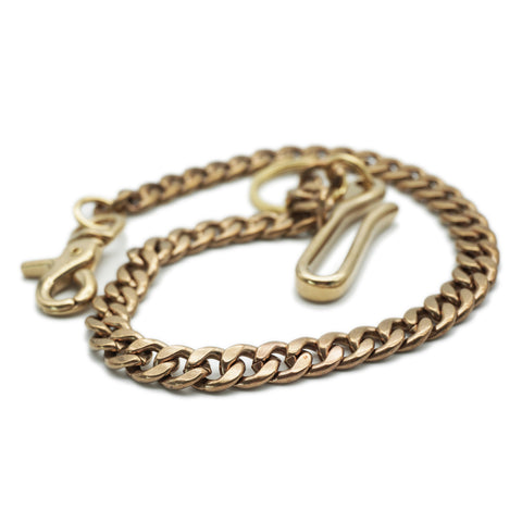 OGL Type 2 Cuban-link wallet chain showing closely interlocking solid brass links and natural aged finish.
