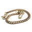 OGL Type 2 Cuban-link wallet chain showing closely interlocking solid brass links and natural aged finish.
