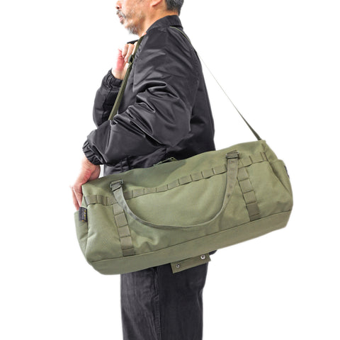 OriGinaLe Boston duffle bag shoulder carry lifestyle by model in Rugged Gentlemen Shoppe Singapore