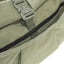Showing front pocket of OriGinaLe Origo Roll-Top Hobo Bag in olive abrasion-resistant technical canvas